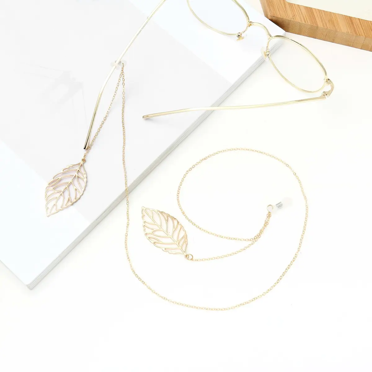 Gold-colored eyeglasses chain