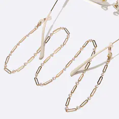Gold-colored eyeglasses chain
